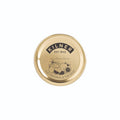 Gold lid with Kilner logo on a white background