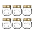 Set of six Kilner jars with gold lids on a white background