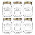 Set of six Kilner jars with gold lids on a white background