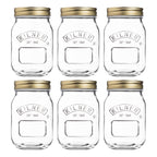 Set of six Kilner jars with gold lids on a white background