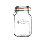 Clear glass Kilner jar with a metal clasp on a white background