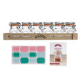 Set of clear glass jars with wooden crate and packaging on a white background