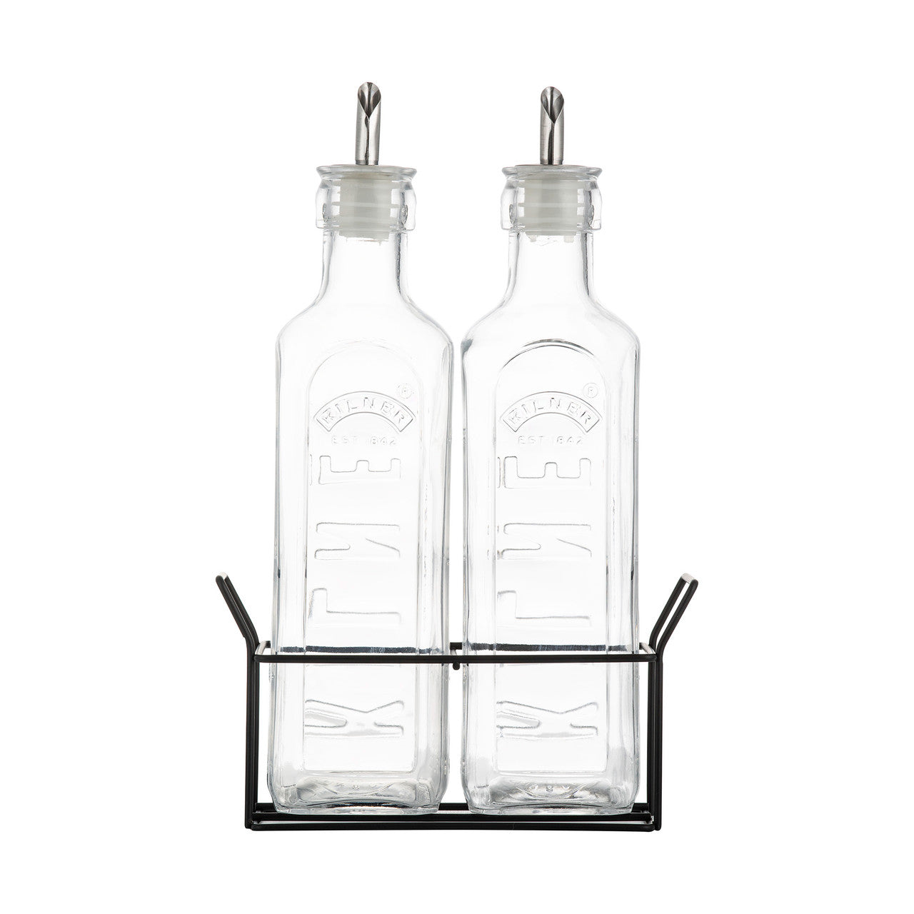Two glass bottles with metal lids in a black metal stand on a white background