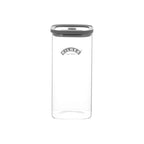 Tall, square glass jar on white background